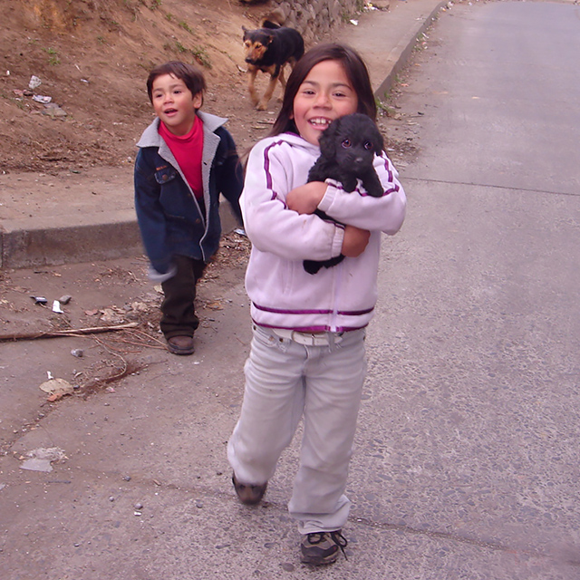 Kids at Lota tent camp with dogs, Kinship Circle
